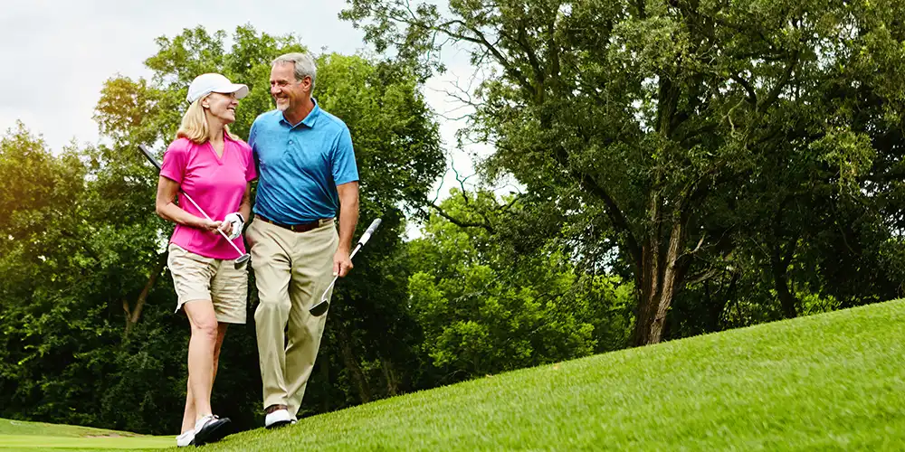 Couple golfing